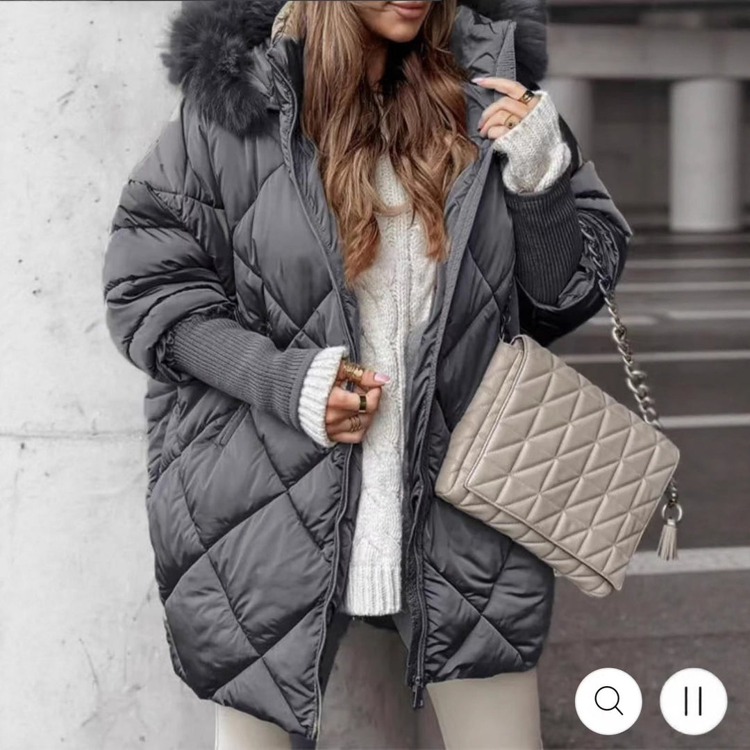 Women longer quilted winter parka with large hood and faux fur trim Mune Fashion