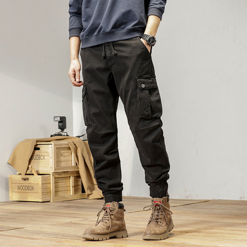 Men's robustly cut canvas cargo jogging pants with drawstring waist, knee patches, and elastic ankle cuffs Mune Fashion