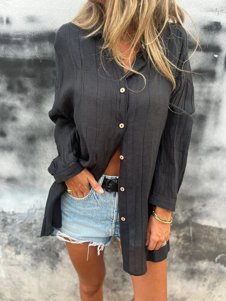Women's casual oversized tunic shirt with linen texture, wood button placket, and elongated hem Mune Fashion