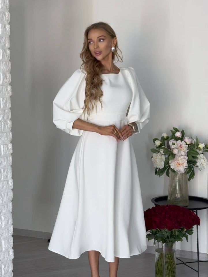 Women's midi dress with open back cutout, voluminous puff sleeves and tie belt Mune Fashion