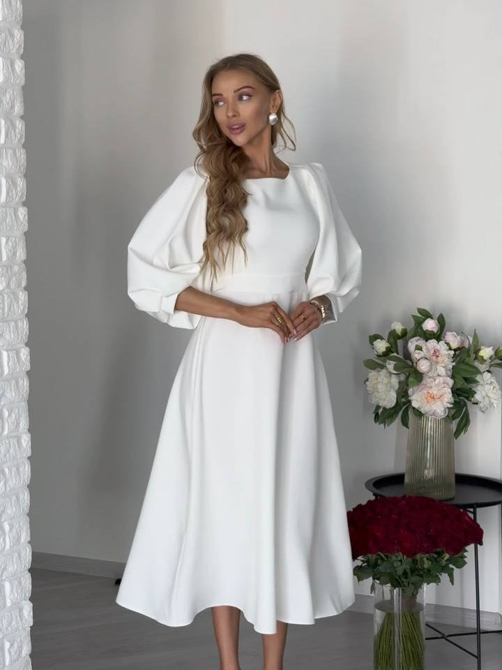 Women's midi dress with open back cutout, voluminous puff sleeves and tie belt Mune Fashion