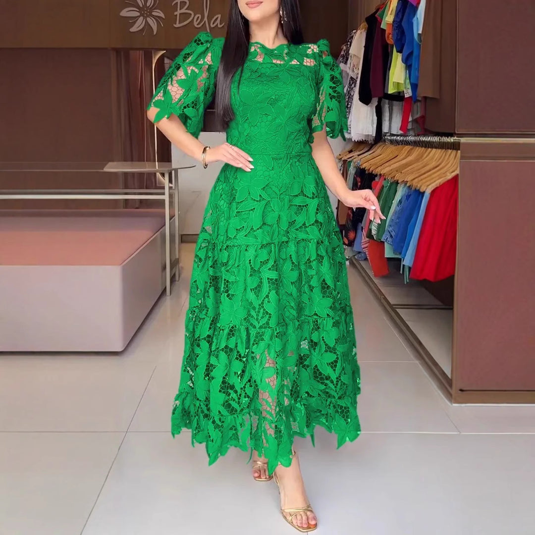Women's maxi dress made of floral guipure lace with a fitted silhouette and tiered hem Mune Fashion