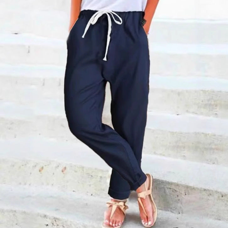 Women's casual relaxed pants with elastic waistband, drawstring, side pockets, and rolled hem Mune Fashion