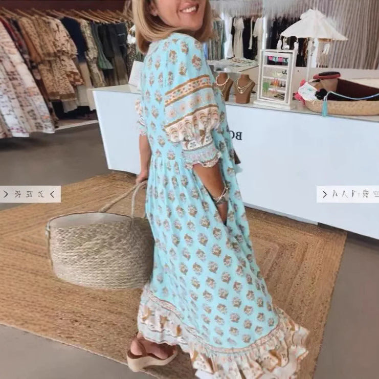 Women Boho Maxi Dress made of lightweight viscose blend with V-neck, tassel tie, three-quarter sleeves, and side pockets Mune Fashion
