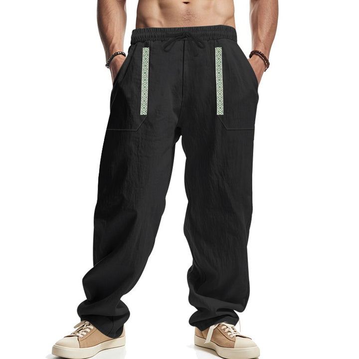 Men's loose-fitting casual pants made of linen blend with elastic waistband, deep side pockets, and ethnic decorative band Mune Fashion
