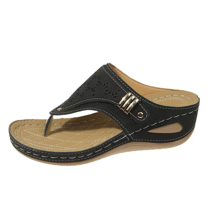 Women's comfortable thong sandal with ergonomic comfort footbed and decorative perforation Mune Fashion