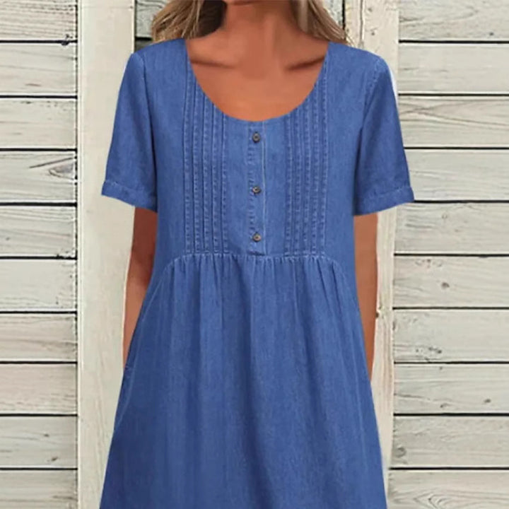 Ladies' knee-length dress in denim look with round neckline, chest piping and side inset pockets Mune Fashion