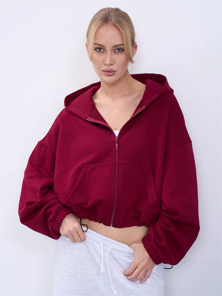Women's casual cropped fleece hoodie with drawstring waistband, raglan sleeves and zip closure