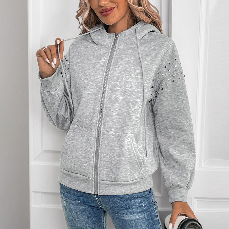Women's zip-up hoodie with pearl detail on the sleeves Mune Fashion