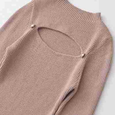 Women's Ribbed Stretch Fine Knit Sweater with Chest Cut-Out and Decorative Buttons Mune Fashion