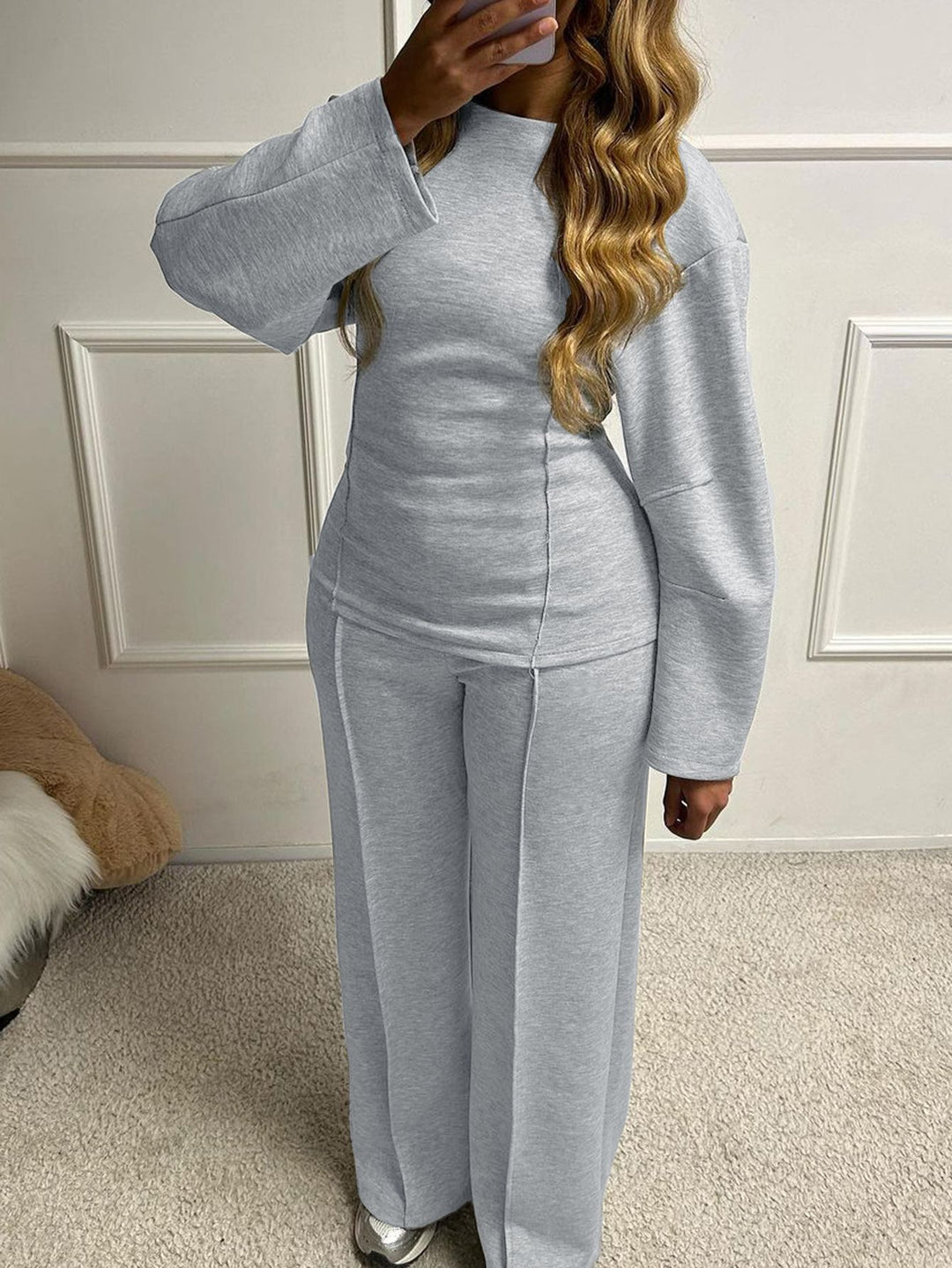 Women's soft lounge set with fitted sweatshirt, sculpting seam details, and wide palazzo pants leg Mune Fashion