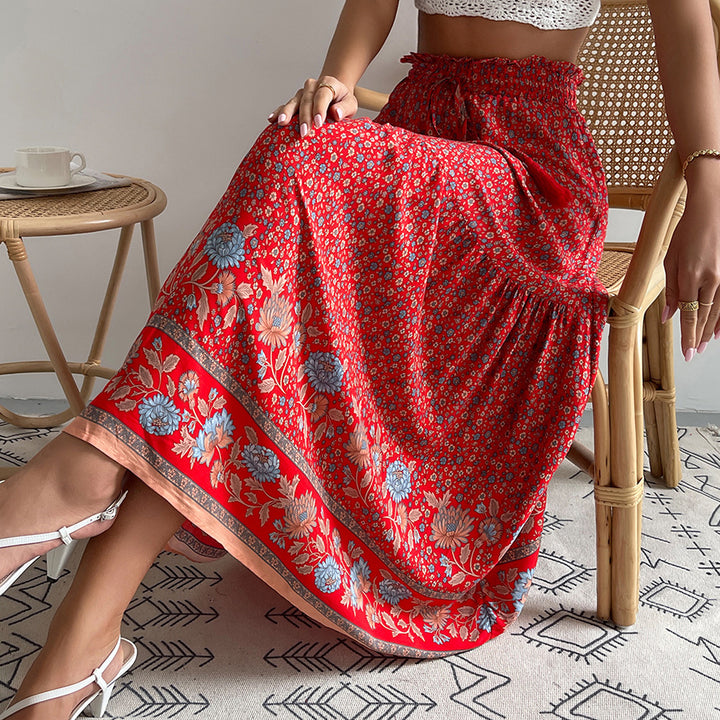 Ladies nan lightweight tiered maxi skirt with elastic ruffle waistband, cord tassel and delicate paisley print Mune Fashion