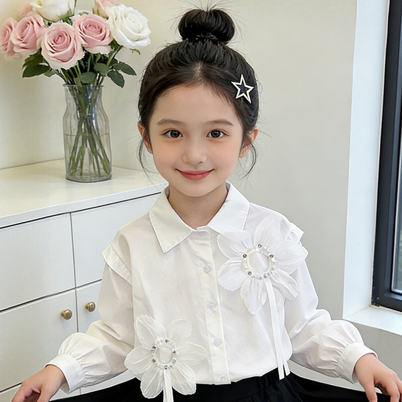 Girl's blouse with floral appliqués and elegant ruffle details Mune Fashion
