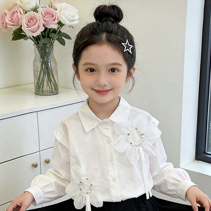 Girl's blouse with floral appliqués and elegant ruffle details Mune Fashion