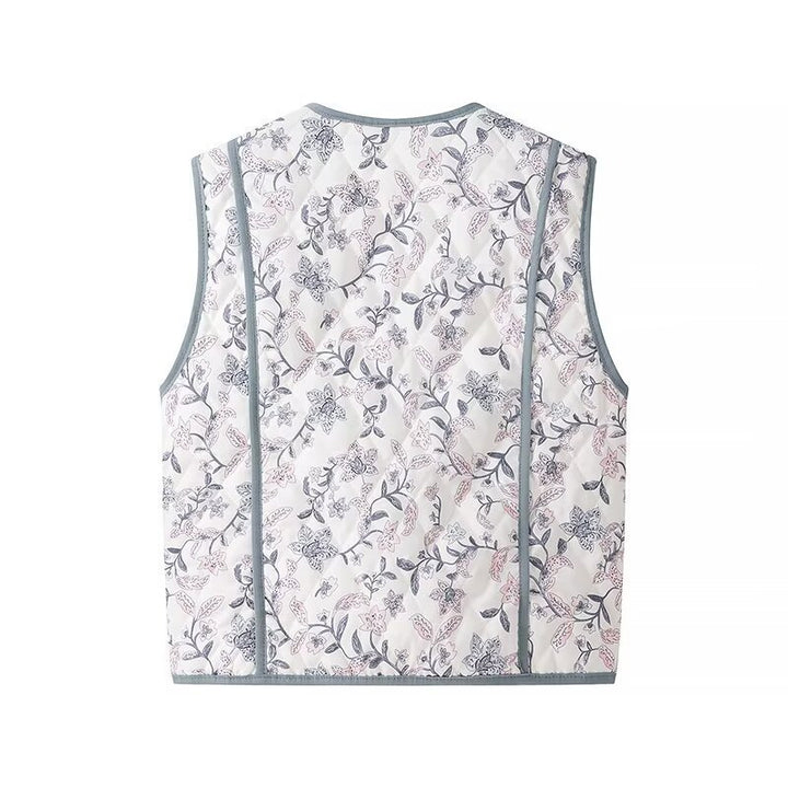Women's light quilted vest with floral print, V-neck and side pockets Mune Fashion