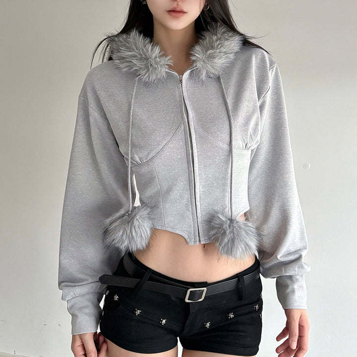Women's cropped hoodie sweatshirt with faux fur trim, zipper, and pom-pom cords Mune Fashion