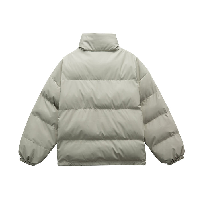 Unisex Boxy padded oversized puffer jacket with stand-up collar and statement patch details Mune Fashion