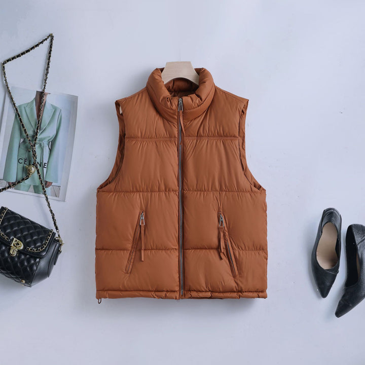 Women nan padded quilted vest with high stand-up collar, two-way zipper and concealed zippered pockets Mune Fashion