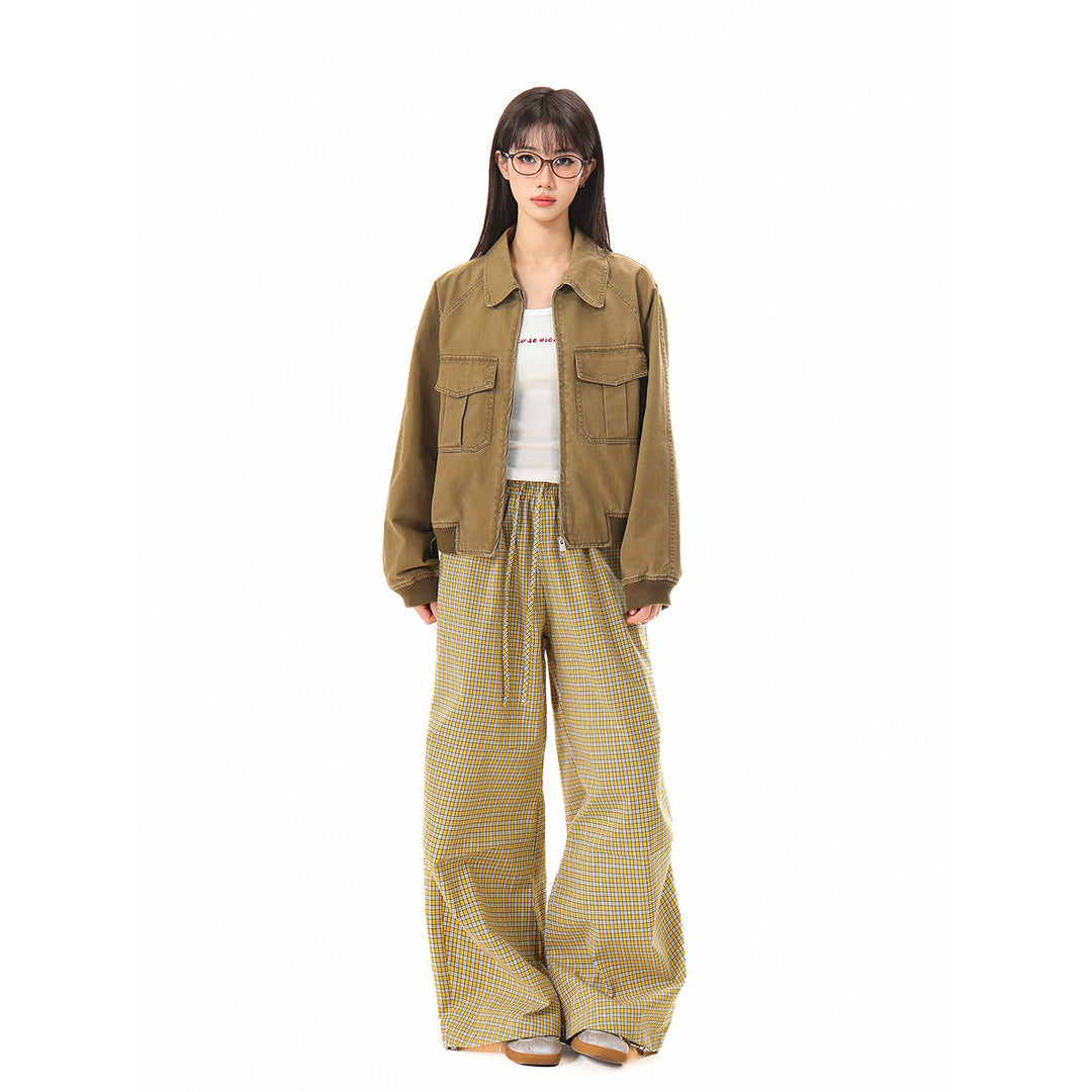 Women's cropped boxy bomber jacket made of cotton blend with flap pockets and full-length zipper Mune Fashion