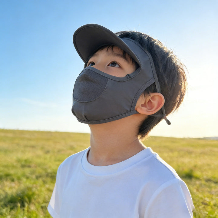 Unisex nan children's sun visor with integrated breathable face mask, adjustable neck strap, and perforated chin area Mune Fashion