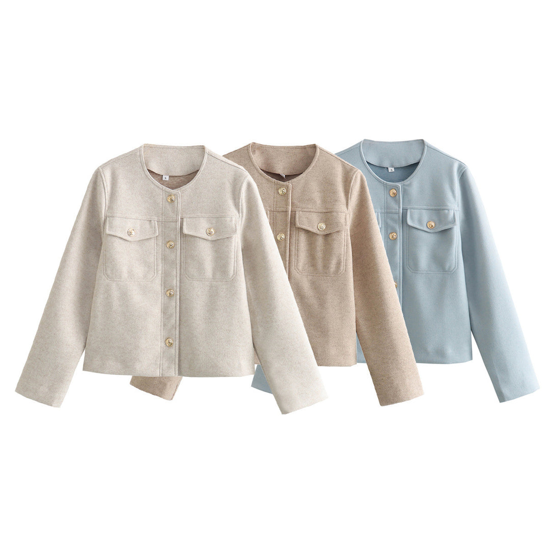 Women's structured short jacket with round neck, breast pockets, and decorative metal button strip Mune Fashion