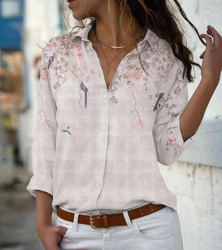 Women’s lightweight chiffon blouse with floral bird print, button placket and casual cut Mune Fashion