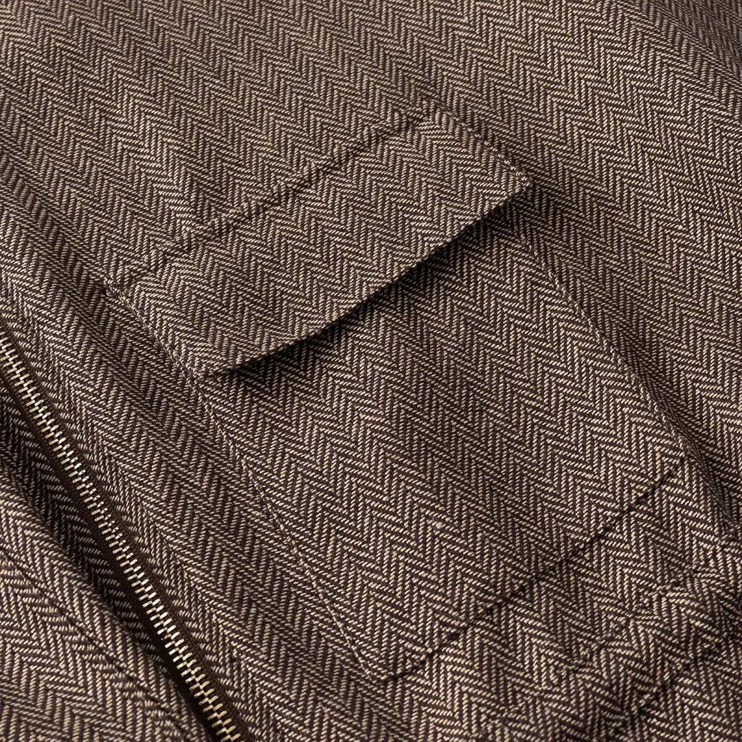 Women's short-sleeved tailored transition jacket with zipper, drawstring, and patch chest pockets Mune Fashion