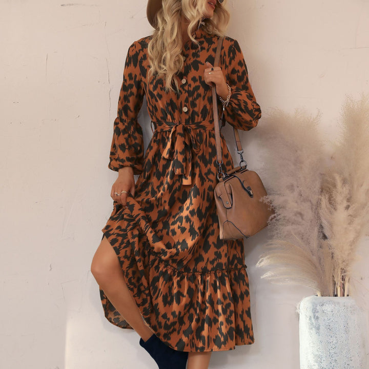 Women’s midi dress with animal print, button placket, waist belt and tiered skirt Mune Fashion