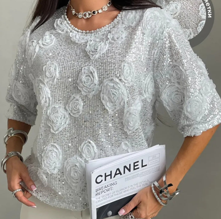 Women nan elegant sequin blouse with three-dimensional rose appliqués, round neckline and half-length sleeves Mune Fashion