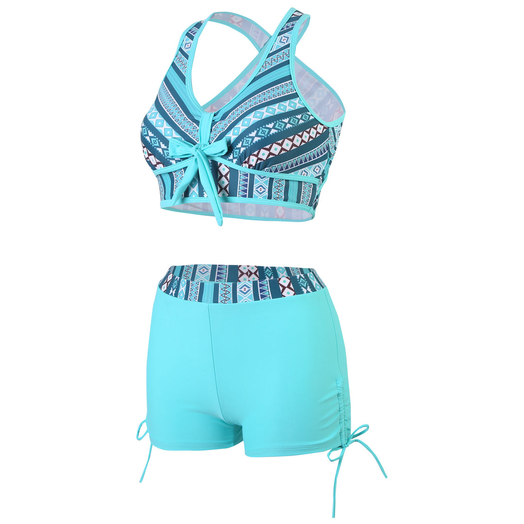 Ladies sporty swimsuit with innovative cross-back design Mune Fashion