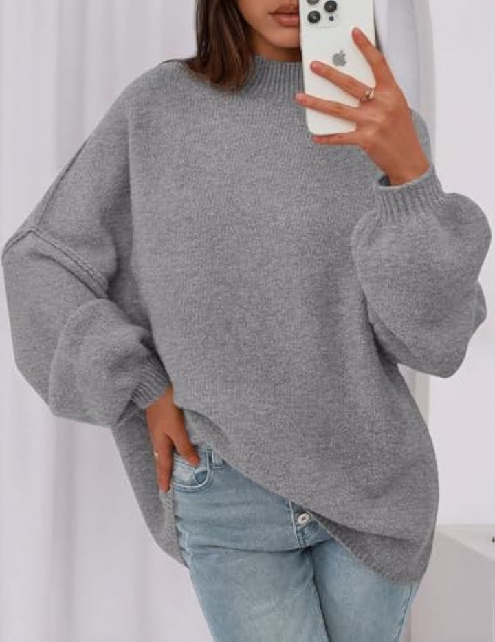 Ladies oversized knitted pullover with stand-up collar and balloon sleeves Drune