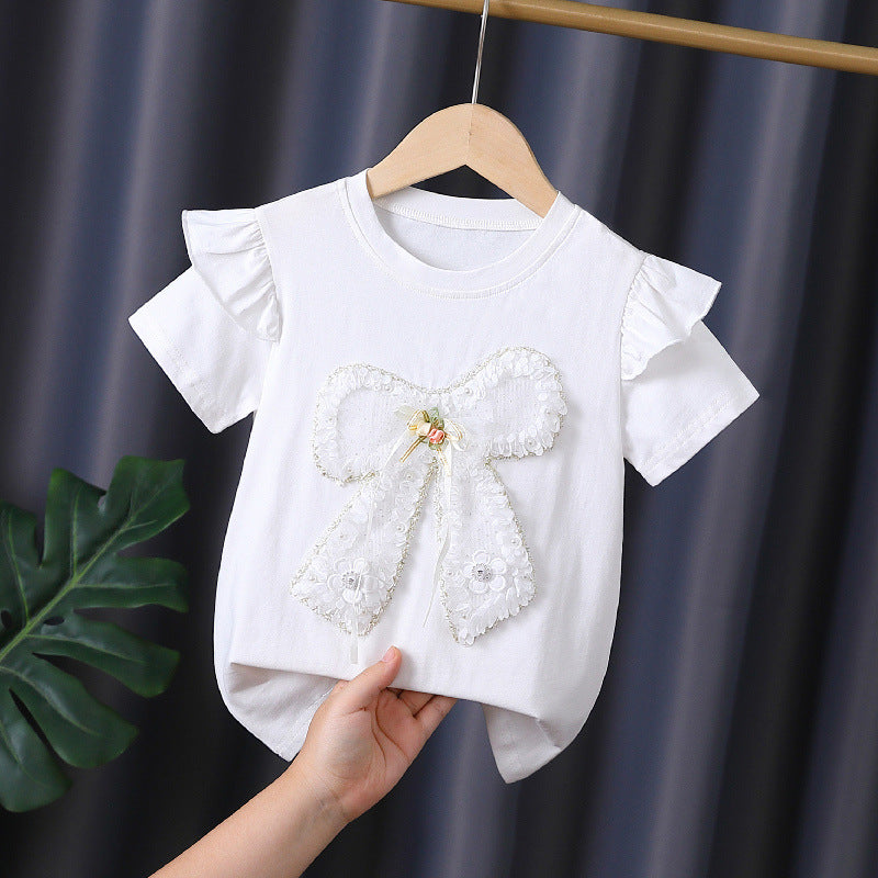 Girls T-shirt with decorative ruffle design and artistic bow motif Mune Fashion