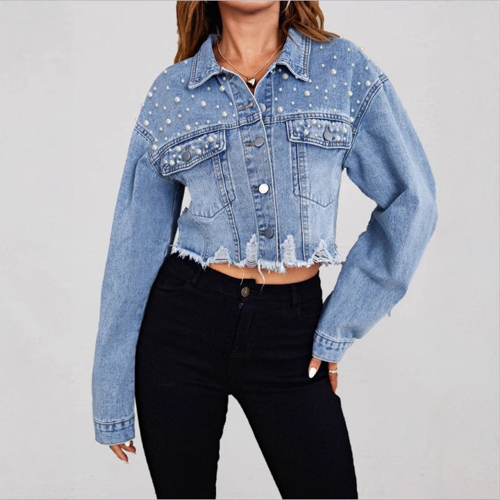 Ladies short denim jacket with pearl embellishments, fringed hem, and wide-cut sleeves Mune Fashion
