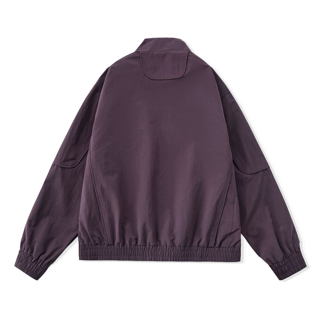 Women Short Boxy Utility Jacket with ergonomic seams, high standing collar and drawstring hood