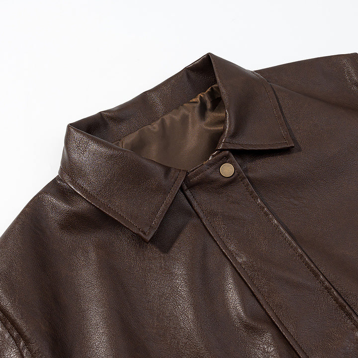 Women's casual faux leather bomber jacket with shirt collar, patch pockets, and elastic hem Mune Fashion