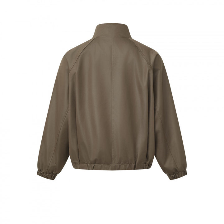 Men's short cut faux leather bomber jacket with stand-up collar, raglan sleeves, and elastic hem Mune Fashion
