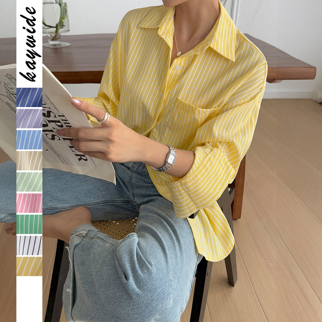 Women's oversized shirt blouse with boxy cut, breast pocket, and rounded hem Mune Fashion
