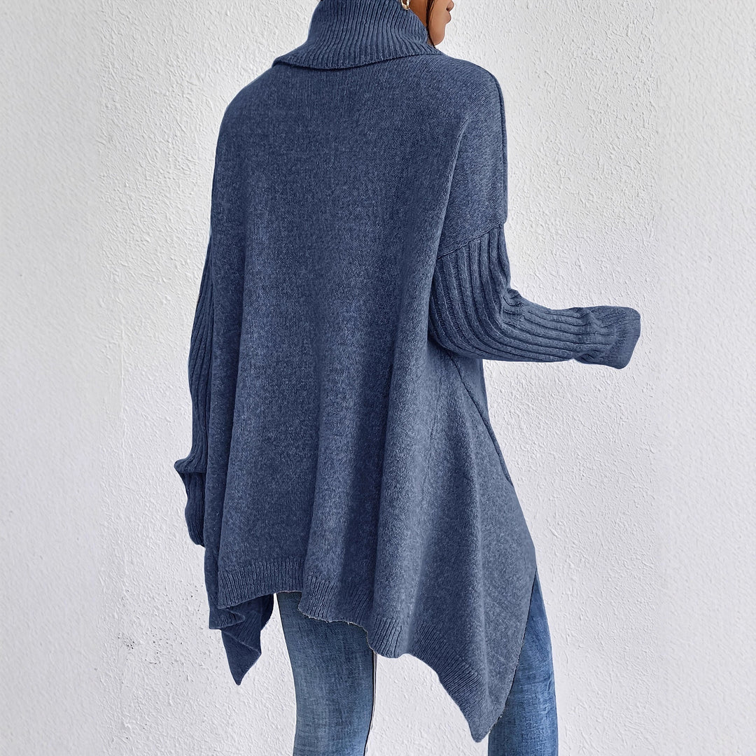 Women's oversized knit sweater with high turtleneck, ribbed sleeves, and asymmetric hem Mune Fashion