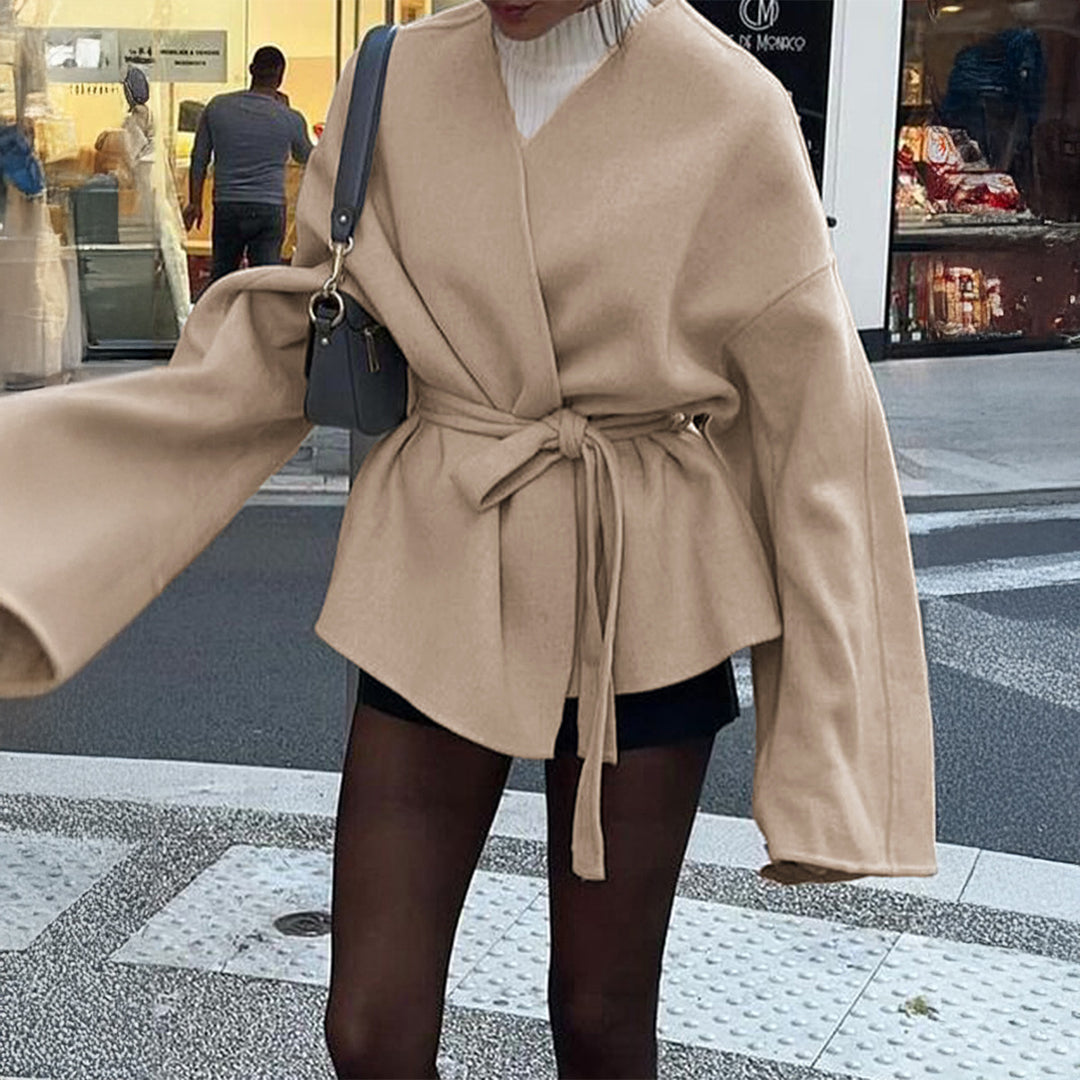 Women’s light wrap coat with tie belt, dropped sleeves and feminine waist emphasis Mune Fashion