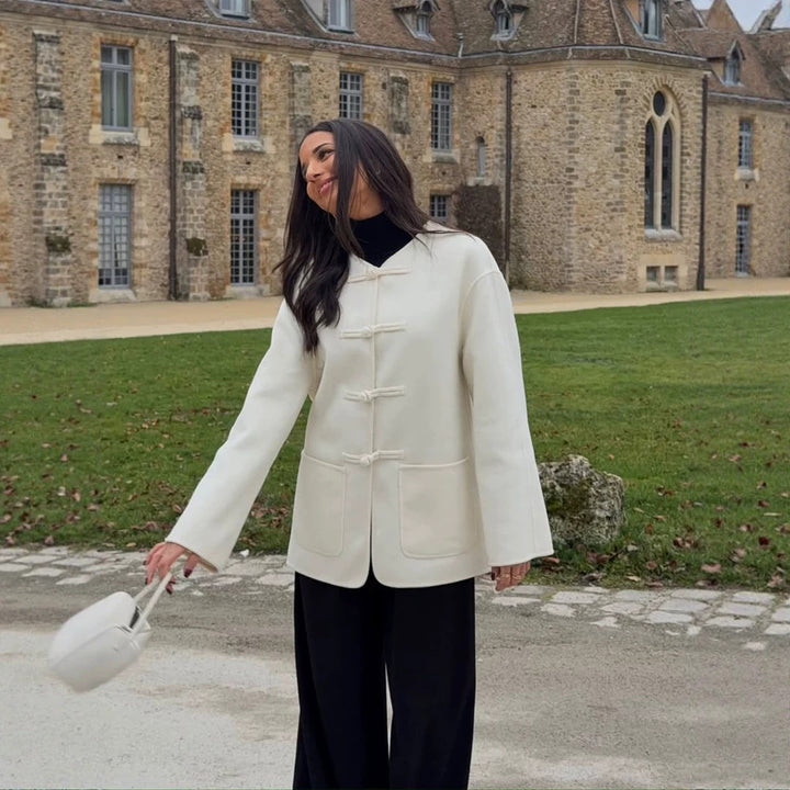 Women's short coat with Chinese toggle closures, oversized sleeves, and patch pockets Mune Fashion
