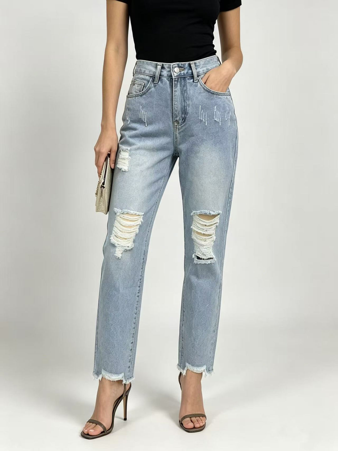 Women's high-waisted Straight Leg Jeans with targeted tear details and raw ankle hem Mune Fashion