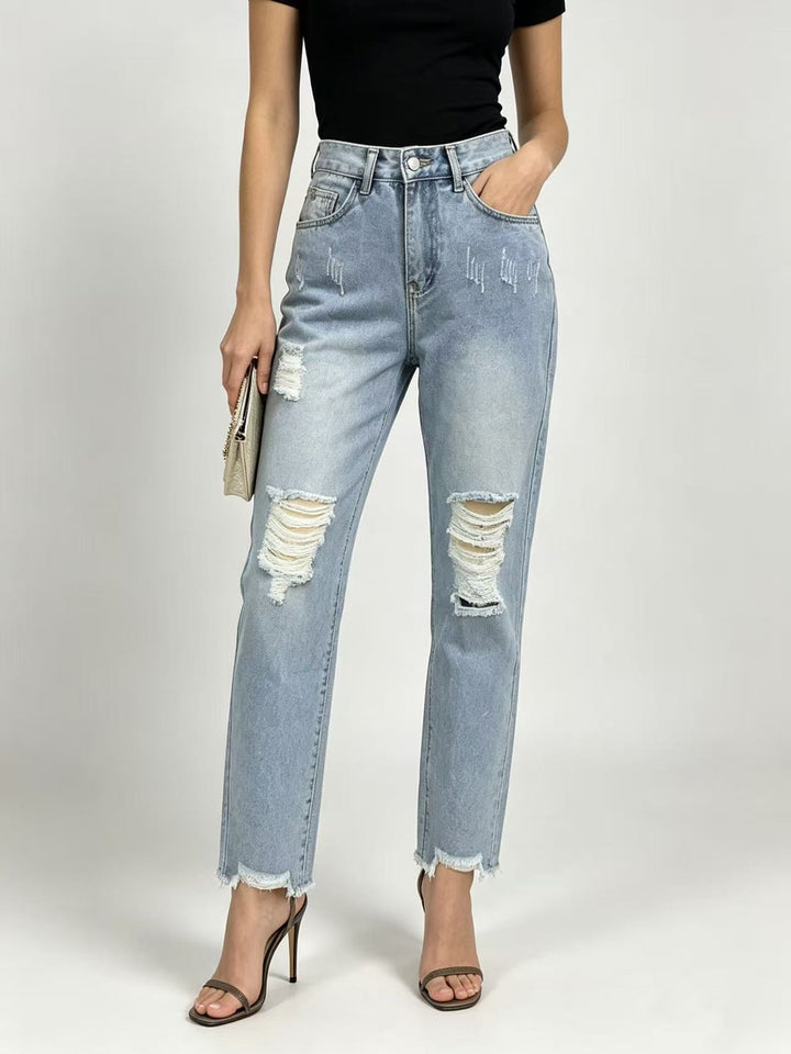 Women's high-waisted Straight Leg Jeans with targeted tear details and raw ankle hem Mune Fashion