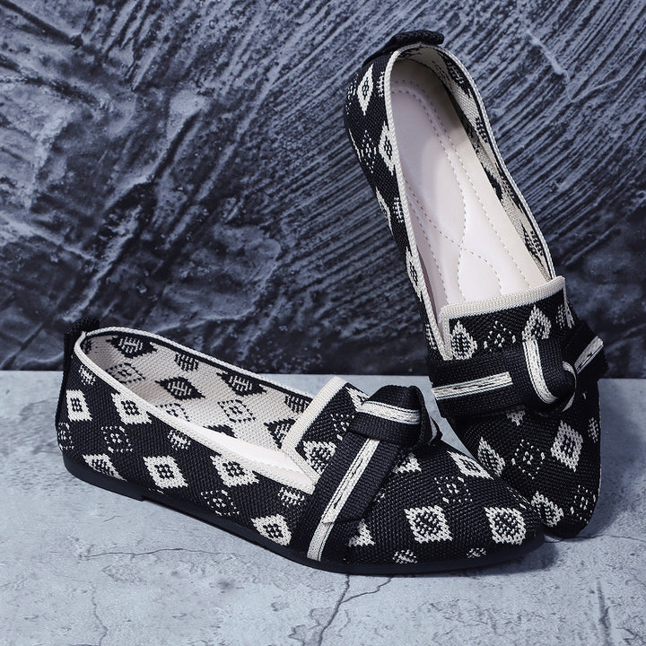 Women's woven lace slippers with decorative bow and padded comfort footbed Mune Fashion