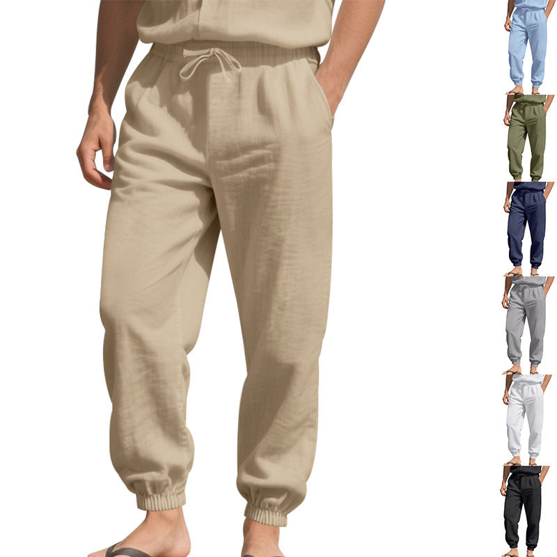 Men's light linen pants with elastic tunnel drawstring waistband, side pockets, and smocked cuffs Mune Fashion