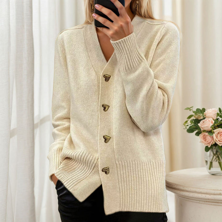 Women's loose knit cardigan with heart buttons and ribbed hem Mune Fashion