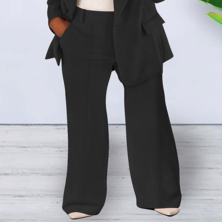 Women’s office-appropriate pantsuit set with wide trousers and tailored blazer Mune Fashion