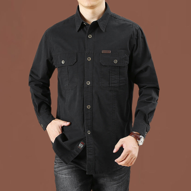 Men's robust cotton twill field shirt with patch flap chest pockets and distinctive seam details.