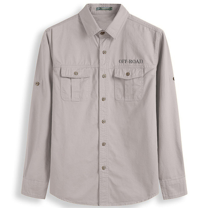 Men's classic safari field shirt with ventilation eyelets, sleeve elevator, and double flap chest pockets.