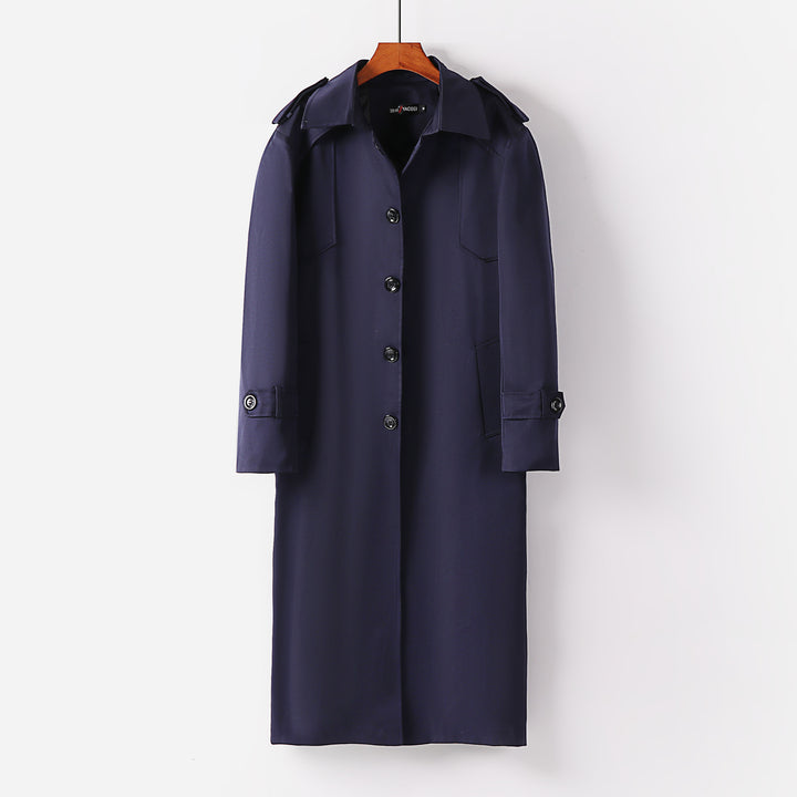 Women's longer classic trench coat with shoulder patches, button closure and adjustable cuffs Mune Fashion