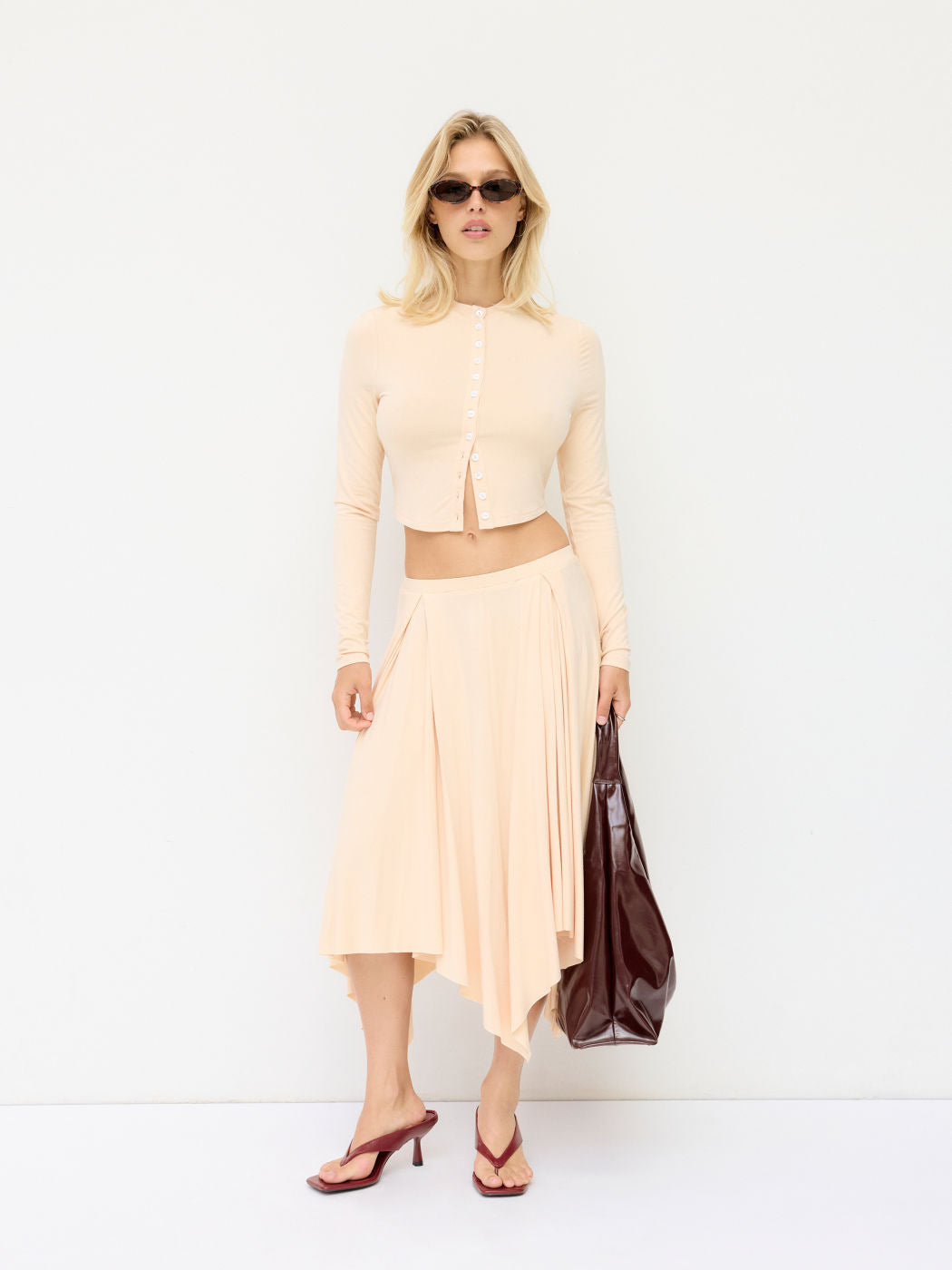 Women Cropped Cardigan with Pearl Buttons and Asymmetrical Pointed Midi Skirt Drune